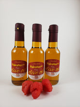 Load image into Gallery viewer, Now this is fiery ! Hot, but not overwhelming, this is for serious hot pepper fans who want the true flavor of Smoked Habañero peppers with balanced heat  Firey Spicy  Habanero Olive Oil Infused with Smoked Habanero Peppers great Marinade or Dipping
